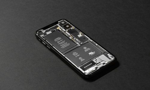 pexels-photo-719399-719399 High-resolution image of a smartphone showcasing its internal components on a dark surface.